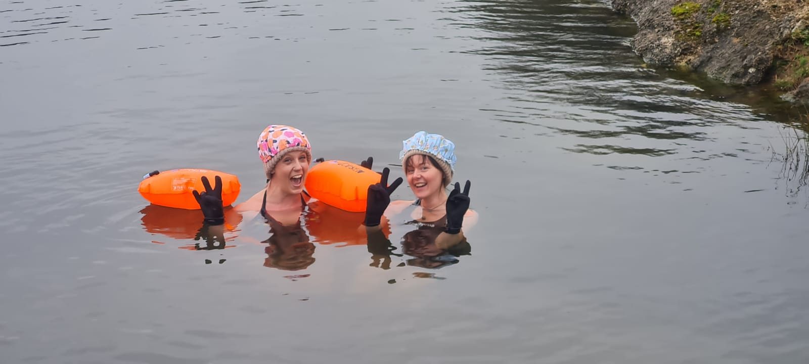 Cold water swimmers beside the sauna